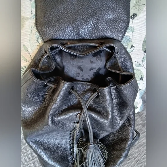 Rebecca Minkoff Isobel Tassel Backpack in Black Pebbled Leather. Rebecca Minkoff Isobel Backpack SKU:8707645 - YouTube main image 4